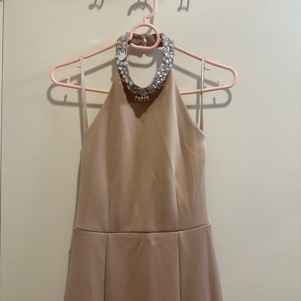 Elegant Beige Halter Dress with Statement Neckline